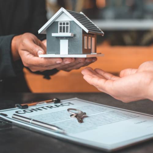 Couple reviewing first home buyer loan grant documents